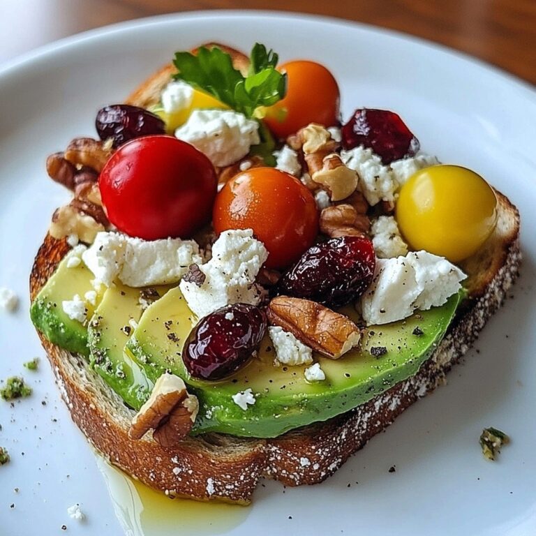 Avocado Toast With Feta Cheese, Cherry Tomatoes, Cranberries, And Walnuts Recipe